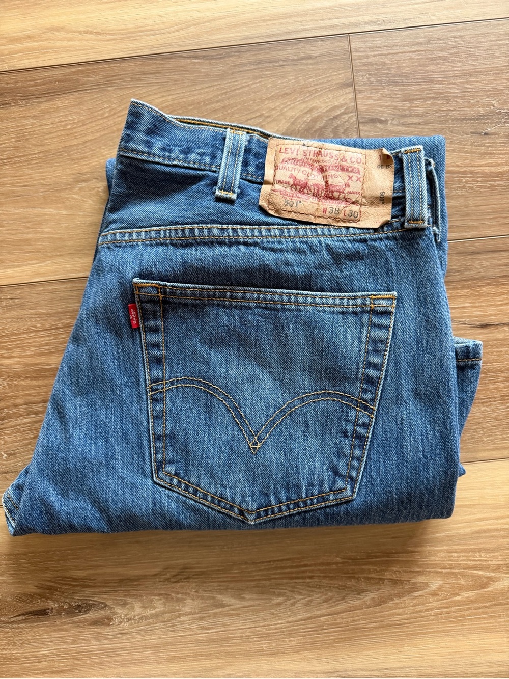 Levi's Men's Straight Denim Jeans in Blue with Tan Patch